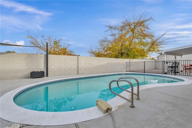 713 Antelope Way, Las Vegas, NV 89145 - view of swimming pool featuring a fenced backyard and a patio