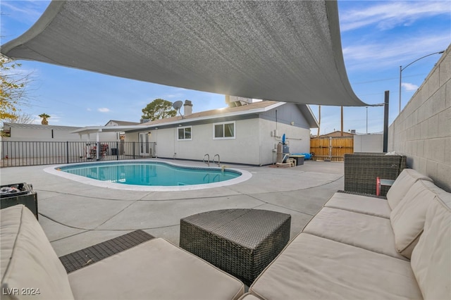 713 Antelope Way, Las Vegas, NV 89145 - view of swimming pool featuring a patio, a fenced backyard, and outdoor lounge area