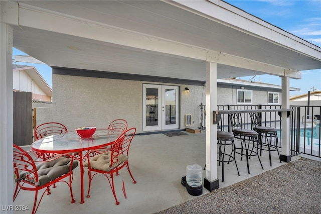 713 Antelope Way, Las Vegas, NV 89145 - view of patio featuring french doors and outdoor dining space