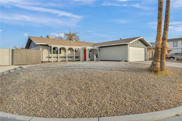 single story home featuring a garage