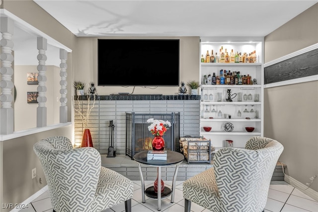 713 Antelope Way, Las Vegas, NV 89145 - living area featuring tile patterned flooring and a brick fireplace