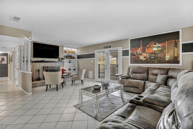 713 Antelope Way, Las Vegas, NV 89145 - living room with light tile patterned floors, a fireplace, and built in shelves