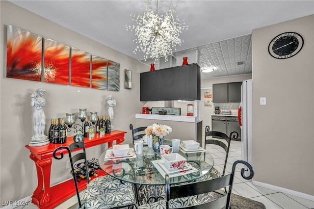 713 Antelope Way, Las Vegas, NV 89145 - dining area featuring a chandelier and light tile patterned floors