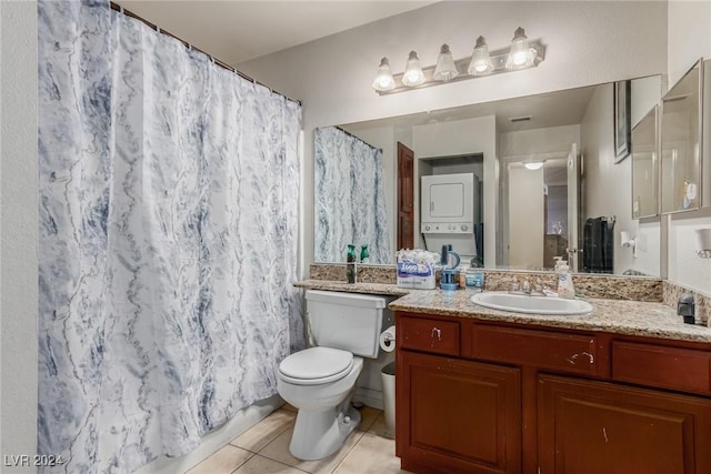 bathroom with tile patterned floors, vanity, toilet, curtained shower, and stacked washer / drying machine