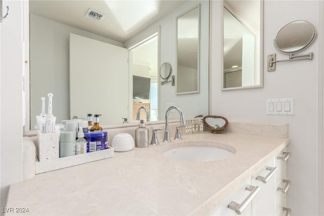 bathroom featuring vanity