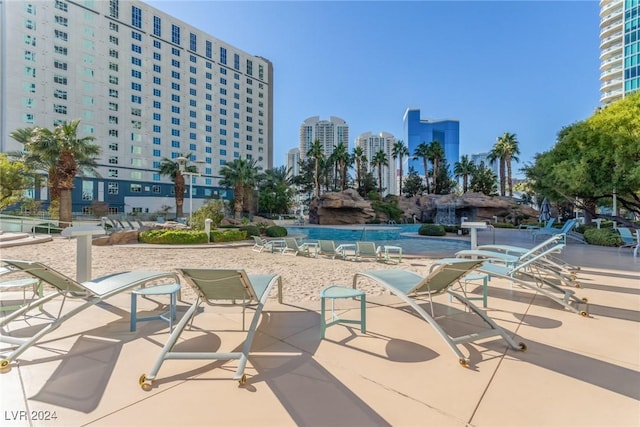 view of swimming pool featuring a patio