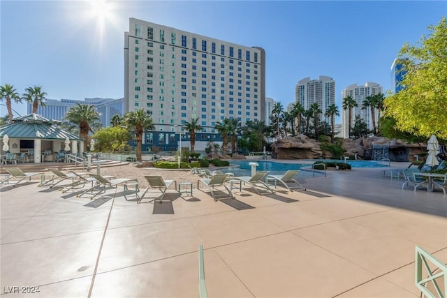 view of swimming pool featuring a gazebo and a patio