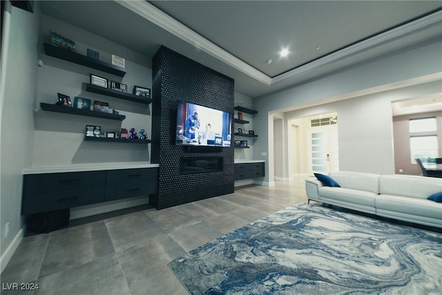 living room with a raised ceiling