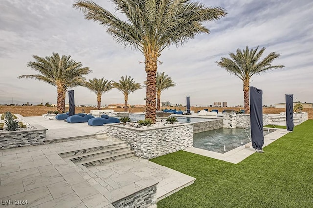 view of yard with pool water feature and a patio area