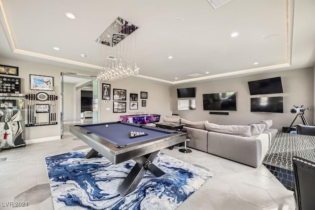 recreation room featuring pool table, light tile patterned floors, and a tray ceiling