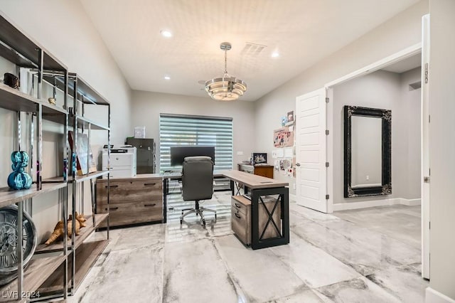 office space featuring an inviting chandelier