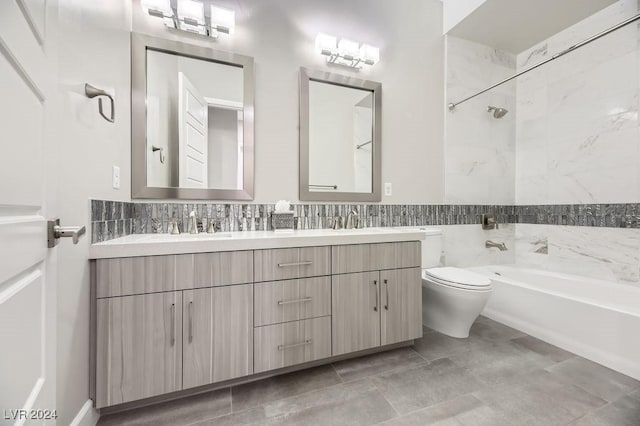 full bathroom with tiled shower / bath combo, vanity, tile walls, and toilet