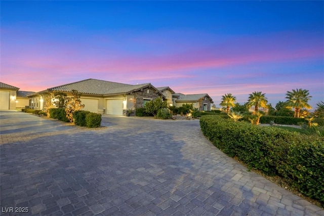 view of front of property with a garage