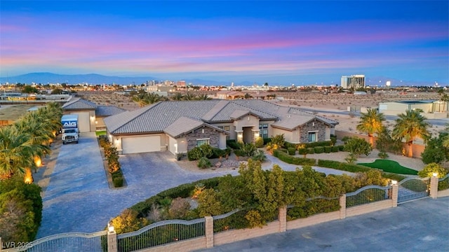 view of front of property with a garage