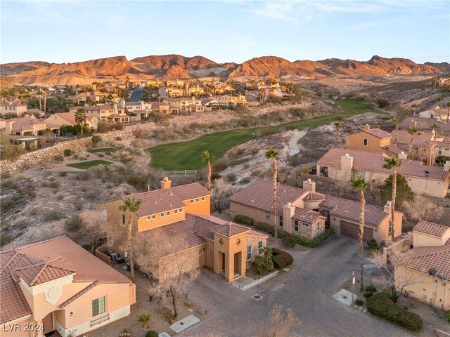 drone / aerial view with a residential view and a mountain view