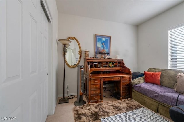 living area with carpet