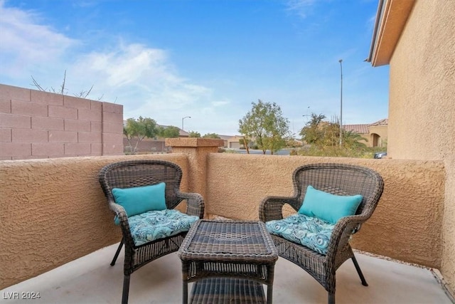 view of patio / terrace with a balcony