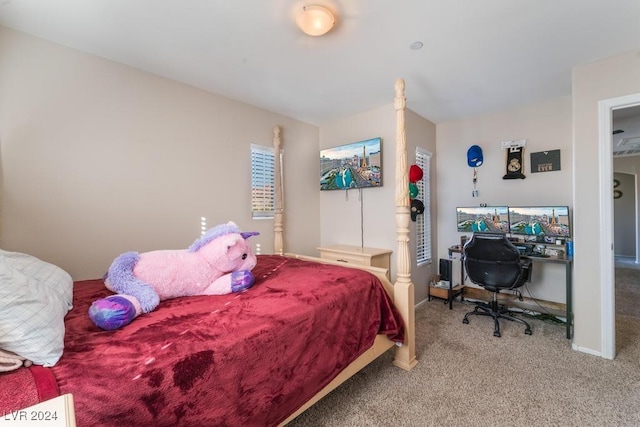 bedroom featuring carpet