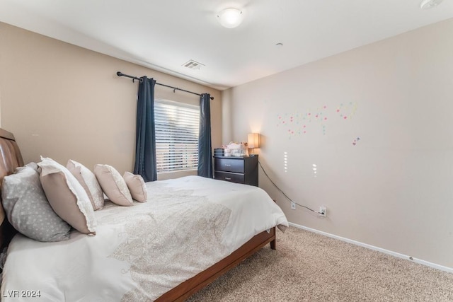 bedroom featuring carpet