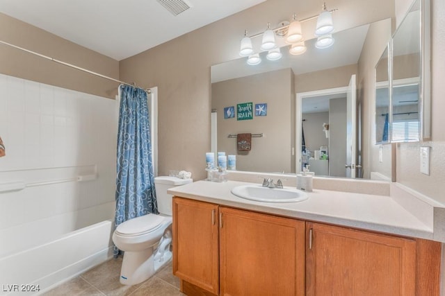 full bathroom with tile patterned flooring, vanity, shower / bath combination with curtain, and toilet