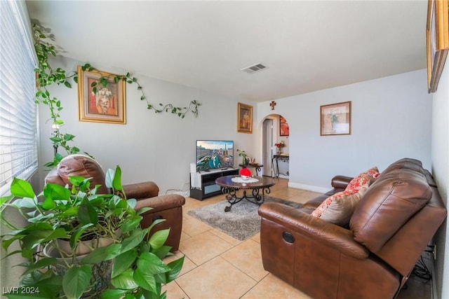 living room featuring light tile patterned floors