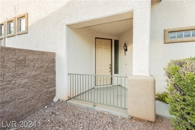 doorway to property featuring a porch