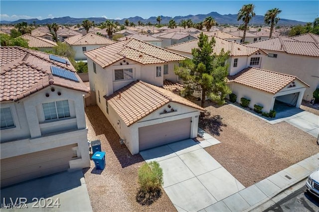10142 Rice Paper St, Las Vegas, NV 89183 - aerial perspective of suburban area with a mountainous background