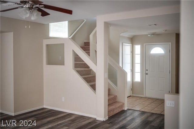10142 Rice Paper St, Las Vegas, NV 89183 - entrance foyer with wood finished floors, stairs, and ceiling fan