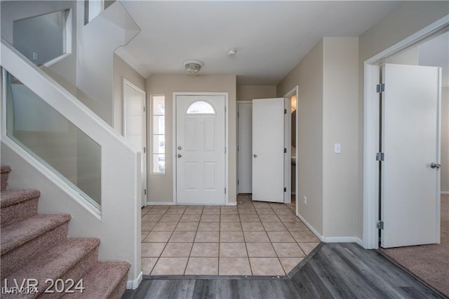 10142 Rice Paper St, Las Vegas, NV 89183 - foyer with stairway and light wood finished floors