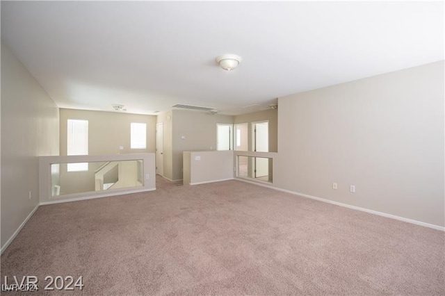 10142 Rice Paper St, Las Vegas, NV 89183 - carpeted spare room with baseboards