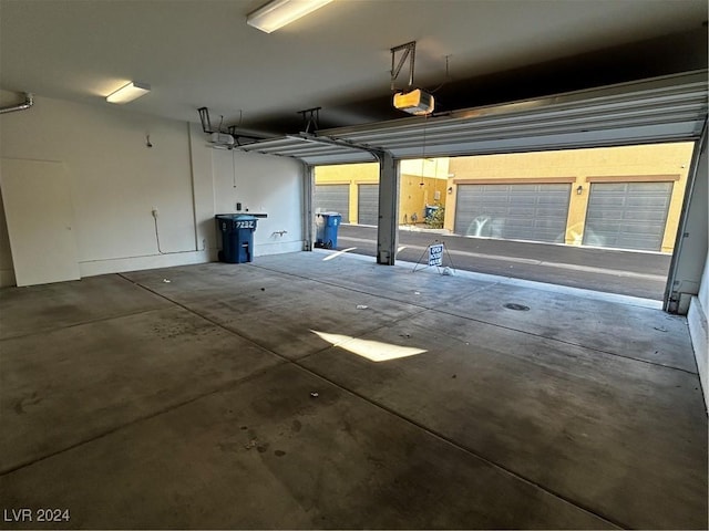 garage featuring a garage door opener