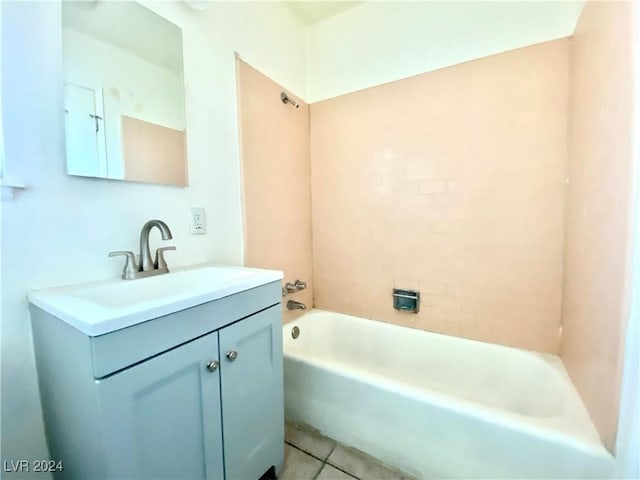 bathroom with tile patterned flooring and vanity