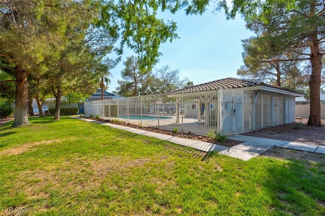 view of yard with a fenced in pool and a patio