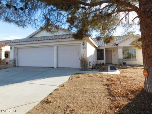 ranch-style house with a garage