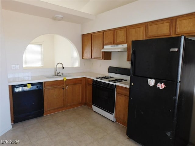 kitchen featuring sink and black appliances