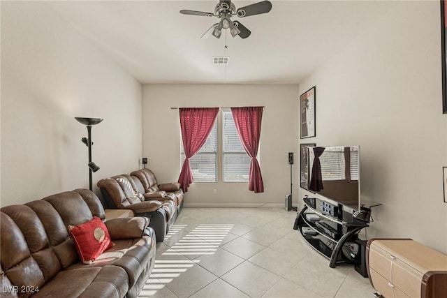 living room with light tile patterned floors and ceiling fan