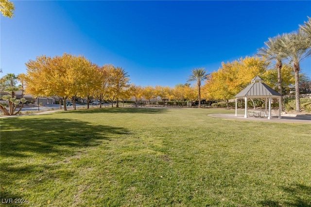 view of community featuring a gazebo and a yard