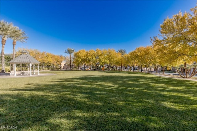 surrounding community featuring a gazebo and a yard