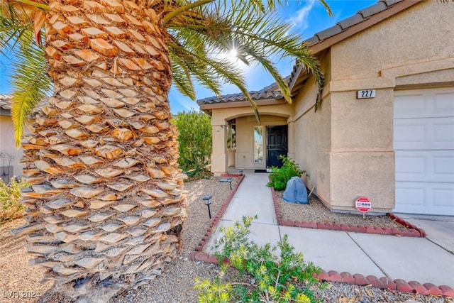 entrance to property with a garage