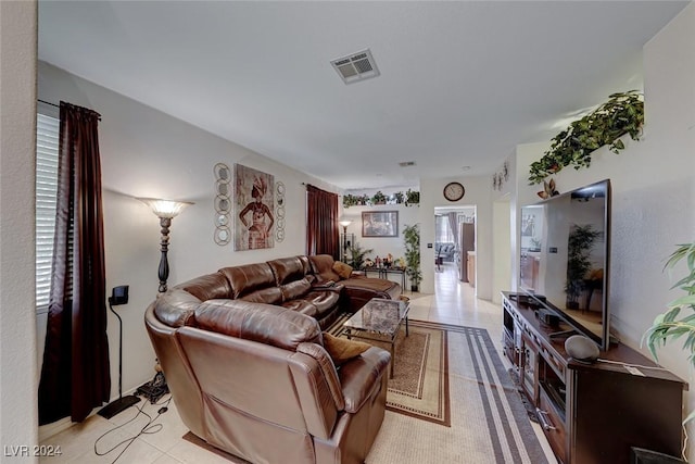 living room featuring light tile patterned floors