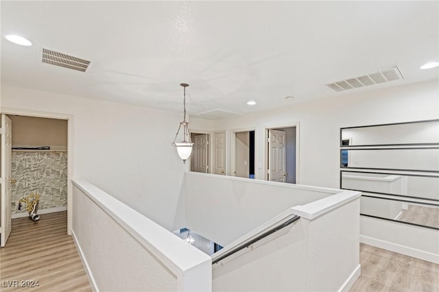 hall featuring light hardwood / wood-style flooring