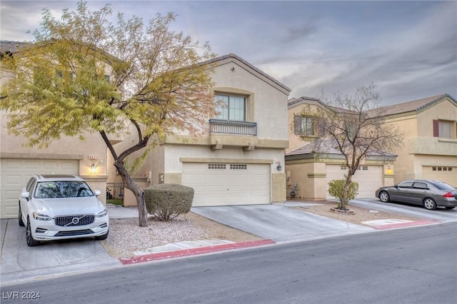 view of front of property with a garage