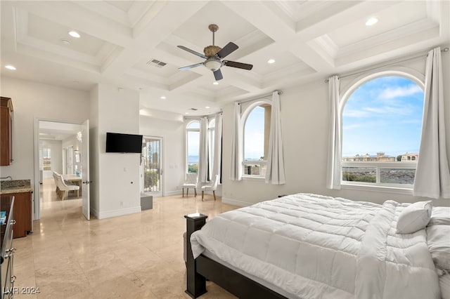 bedroom with ceiling fan, beam ceiling, ornamental molding, and coffered ceiling