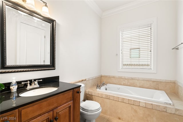 bathroom featuring vanity, toilet, ornamental molding, and tiled tub