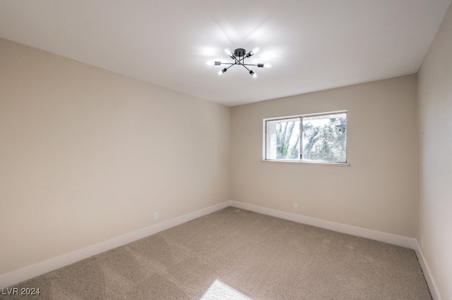 empty room featuring carpet flooring