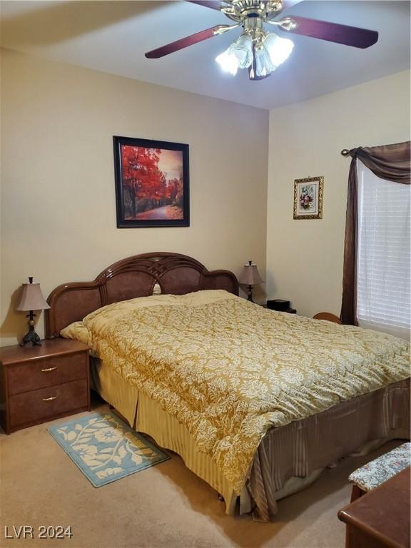 bedroom featuring carpet flooring and ceiling fan