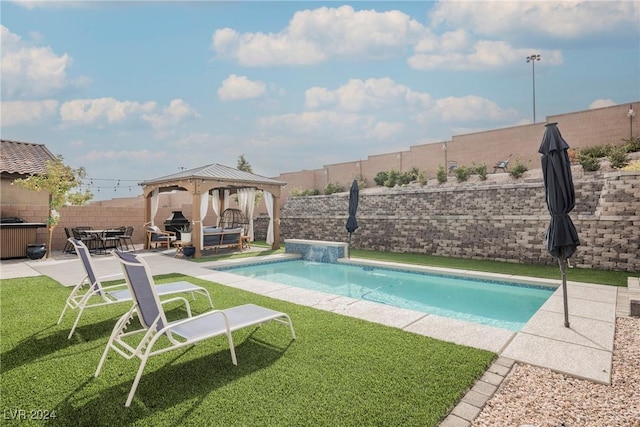 view of pool featuring outdoor lounge area, a gazebo, and a patio area