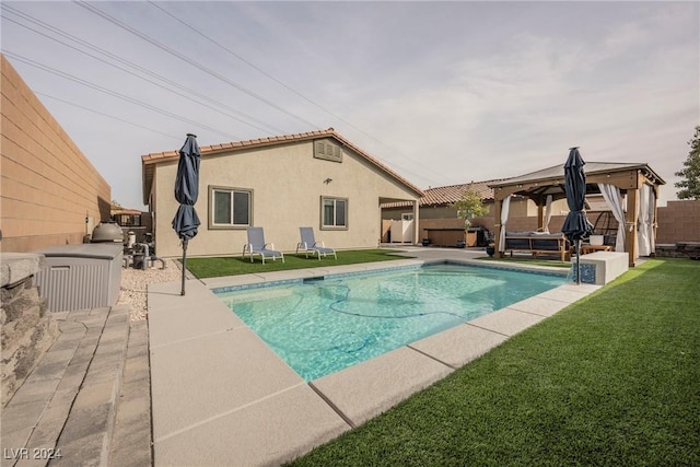 view of pool featuring a gazebo, a patio area, and a yard