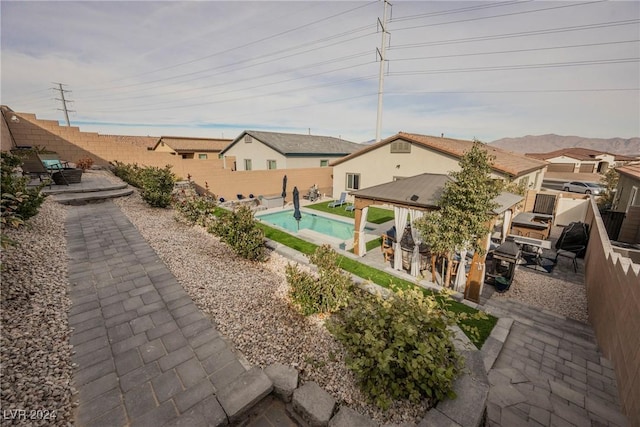 exterior space with a patio and a pool