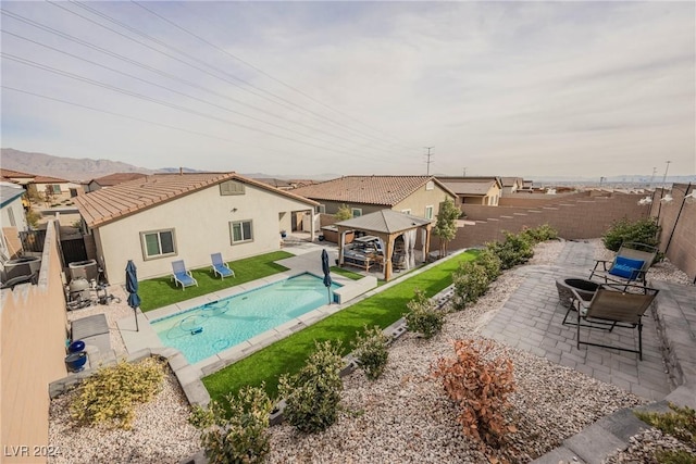 view of pool with a gazebo and a patio area